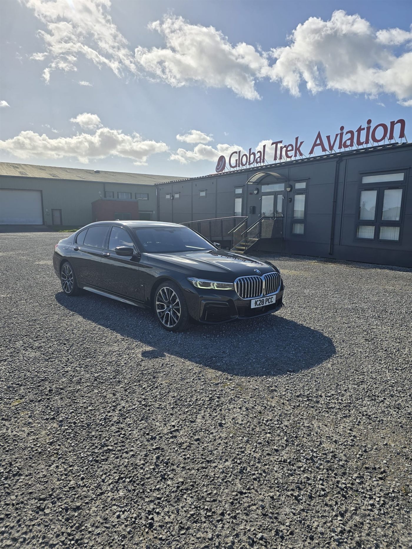 BMW 7 Series Executive Saloon Service — high-gloss black at the Hensol Castle wedding venue